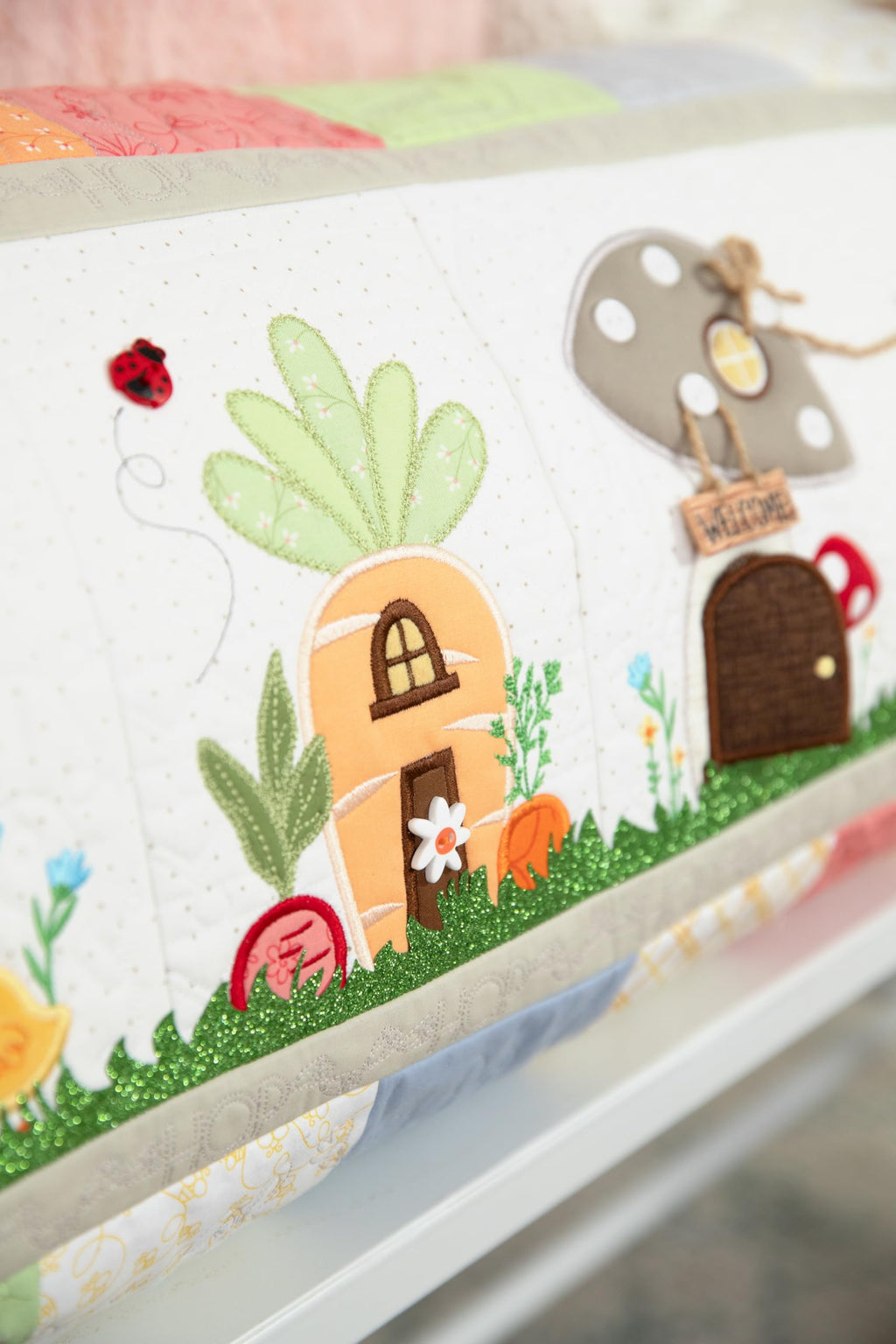 Kimberbell Hoppin’ Down the Bunny Trail Bench Pillow – Machine Embroidery Design CD, 16" x 38" Pillow Pattern with Applique, Textured Fabrics & Custom Buttons – Fits 5x7+ Hoops