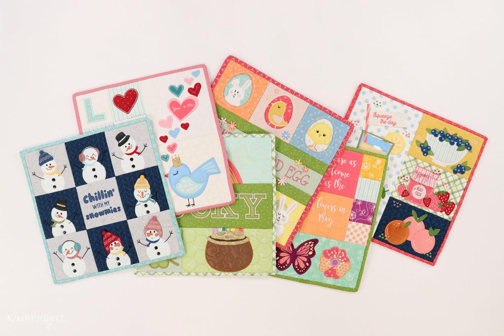 Kimberbell Mini Quilts Volume 1 Bundle – Machine Embroidery CD (Jan–June) and 15-Piece Embellishment Kit | Seasonal 12"x12" In-the-Hoop Quilting Projects for 5x7 or Larger Hoops