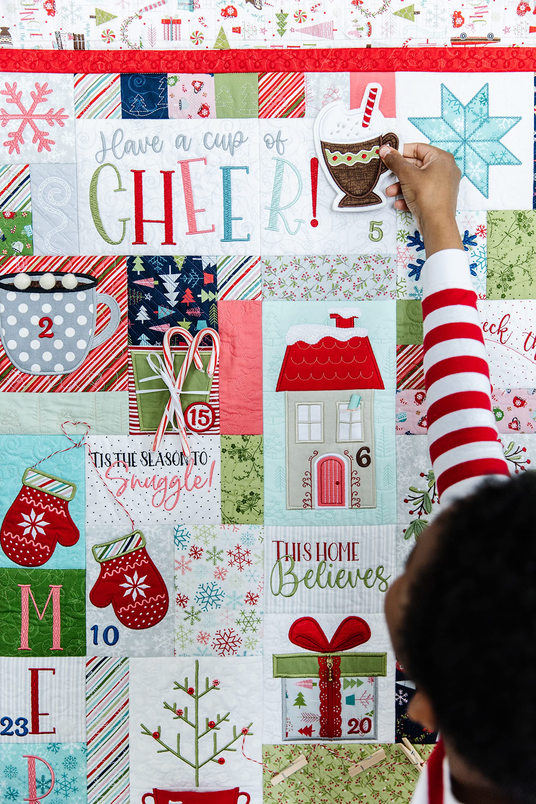 Kimberbell Cup Of Cheer Featured Quilt Machine Embroidery Design CD, 25 Interactive Designs, Complete Size 42x58”, 14 Advent Pieces, Easy Step-By-Step Instructions, Hoop Sizes: 4x4 & 5x7”, Made in USA